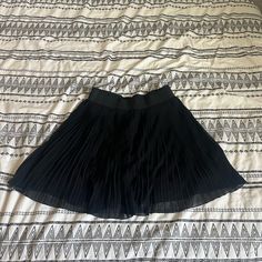 Never Worn! Black Pleated Short Skirt For Spring, Black Pleated Flowy Skirt With Lining, Black Short Pleated Skirt For Spring, Black Flowy Pleated Skirt With Lining, Black Flowy Lined Pleated Skirt, Black Full Mini Skirt For Workwear, Black Flared Pleated Skirt For Night Out, Black Flowy Full Pleated Skirt, Black Full Skirt Skort For Summer