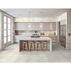 a kitchen with marble counter tops and stools