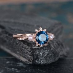 Rose Gold And Pearl Blue Topaz Engagement Ring Infinity Wedding Band Akoya Pearl Birthstone June Bridal Ring Diamond Women Anniversary Gift Same Design with difference gemstone: https://www.etsy.com/listing/612889885 https://www.etsy.com/listing/606125915 https://www.etsy.com/listing/599049598 ITEM INFORMATION: Metal Type- Solid 14K Rose Gold Ring Size Available- US3# -10# *Engagement Ring Details： WIDTH-( approx. 2.3mm ) 1.Center Stone- 6mm Natural Blue Topaz, Round Cut 2.Side Stones - Natural Blue Pearl Engagement Ring, Sapphire Pearl Engagement Ring, Elegant Wedding Jewelry With Topaz, Elegant Topaz Wedding Jewelry, Elegant Topaz Jewelry For Wedding, Elegant Blue Bridal Sets Gift, Fine Jewelry Rose Gold Topaz Wedding Ring, Elegant Topaz Ring With Accent Stones For Wedding, Wedding Sapphire Birthstone Ring With Diamond Accents