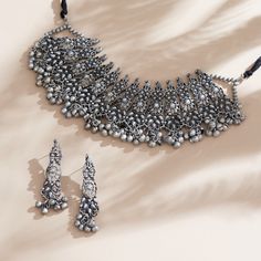 These Indian chokers is oxidized which is created with careful attention to detail. The designer neckpieces & its finishing gives it an elegant look & feel. This design is perfect for parties & functions as these chokers are specially designed for Indian Beautiful Brides -Base Metal- Silver, Brass -Plating- Oxidized Silver/Black Polish/Afghani -Stone- Pearls -Sizing-Non Adjustable -Type- Chokers -Light Weight -FREE Shipping -Gift Wrapping Available -Delivery from a Small Business in India -Handmade Product Skin Friendly- Lead & Nickel Free in compliance with all International Requirements. Gift - Ideal Valentine, Birthday, Anniversary gift for someone you Love/ Best Friend/Girlfriend. Occasion - Festivals, Wedding, Party Wear, Perfect For Indian Weddings We tried to cover as many details a Indian Black Necklace, Oxidized Finish Necklace For Festivals, Oxidized Choker, Oxidised Choker, Love Best Friend, Floral Choker, Choker Designs, Choker Black, Oxidized Necklace