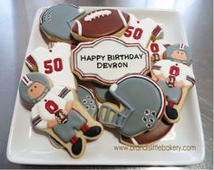 a football themed birthday cake with cookies