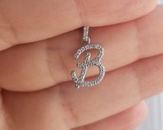 "14K SOLID WHITE GOLD INITIAL PENDANT - NECKLACE WITH DIAMONDS Metal : 14K Solid Gold Necklace Length : 16 inches / 40cm Letter Height : 19.75mm Letter Width : 10.50mm Letter Thickness : 1.9mm Diamond : 36 Diamonds --- Nice White Color Sparkle Diamonds ---- G-H color SI2 clarity Total Carat: 0.36 Carat (Depending on the letter) ---MADE IN USA--- ---All letters from A to Z are available. Please indicate your letter choice in the \"notes to seller\" section on the order. ---This is a beautiful 14K Diamond Initial Pendant Jewelry With Single Diamond, Letter Necklace Initials Diamond, Diamond Initial Pendant With Diamond Cut, Yellow Gold Initial Pendant With Diamond Accents, Diamond Alphabet Pendant Letters, Gold Initial Pendant, Diamond Initial Necklace, Initial Pendant Necklace, Solid Gold Necklace