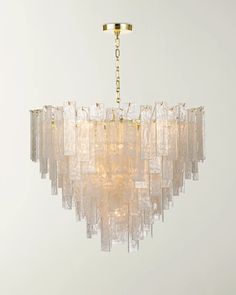 a chandelier hanging from a ceiling in a room