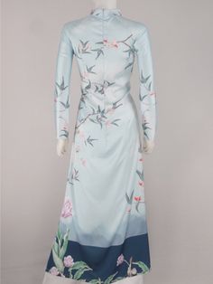 Áo dài lụa xanh Cô gái | Blue Lady Flower Vietnamese Ao Dai Fitted Light Blue Ao Dai For Spring, Blue Fitted Long Sleeve Ao Dai, Vietnamese Ao Dai, Blue Flowers, Size 10, Blue