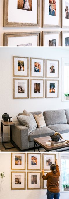 a living room with pictures on the wall and a couch in front of some windows