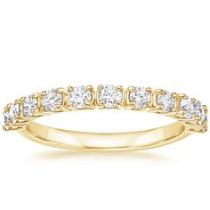 Jade Trau Cella Diamond Wedding Ring - 18K Yellow Gold. Sparkling diamonds grace the top half of this high polish ring creating a romantic yet modern look that's as glamorous as it is comfortable to wear. Pair with satin finish or non-accented bands to create a personalized and chic stack (1/2 total carat weight). 
 
 Jade Trau adds a signature spin on classic diamond staples, crafting designs timeless enough to evolve with you and unique enough to make a statement. Luxury Yellow Gold Bands, Yellow Gold Diamond Ring For Marriage With Prong Setting, Elegant Yellow Gold Diamond Ring For Marriage, Elegant Round Cut Diamond Ring For Marriage, Elegant Yellow Gold Diamond Marriage Ring, Wedding Yellow Gold Diamond Ring With Single Cut Diamonds, Yellow Gold Wedding Diamond Ring With Single Cut Diamonds, Elegant Diamond Ring With Round Band For Marriage, Timeless Yellow Gold Diamond Ring For Marriage