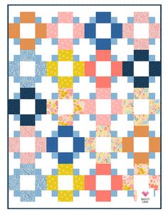 a colorful quilt with squares and dots on the front, in blue, orange, yellow and pink