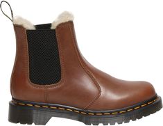 Design: Rich, supple Farrier leather upper for the perfect combination of style and durability Original Dr. Martens® 8-eye design Heel loop for easy on and off Gore detail for ease of entry In-Shoe Comfort: Warm, soft faux-fur lining for added warmth in cold weather Air-cushioned sole for extra comfort Durability & Traction: Heritage, luggy Ben commando outsole for extra traction Doc Martens Winter, Dr Marten Chelsea, Dr Martens 2976, Brown Fur, Beautiful Boots, Leather Chelsea Boots, Liner Socks, Eye Design, Boots Brown