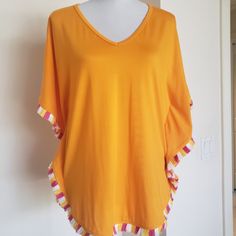 Never Been Worn Beautiful Orange Top With Pink And White Fringe On Seams Striped Stretch Tops For Beach, Striped Stretch Tops For The Beach, Yellow Beachwear Top For Day Out, Yellow Summer Top For Beach Cover-up, Yellow Summer Tops For Beach Cover-up, Yellow Summer Beach Cover-up Top, Yellow V-neck Top For Beach, Front Twist Top, Hooded Tunic