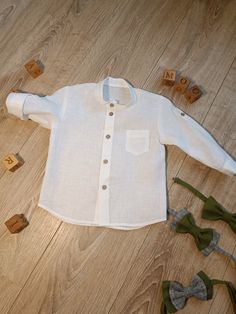 Baby long sleeve linen shirt. The shirt is with wooden buttons and one small pocket on breast. White Long Sleeve Buttoned Shirt, White Long Sleeve Shirt With Buttons, Linen Long Sleeve Shirt With Button Closure, Linen Long Sleeve Top With Button Closure, Long Sleeve Linen Top With Button Closure, Baby Boy Shirts, Boys Tops, Boy Shirt, Wooden Buttons