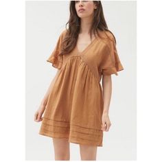 Urban Outfitters Venus Mini Frock Dress In Brown/Gold Size Xs (Can Fit A Size Small As Well) Brand New With Tag Solid Cotton V-neck Mini Dress, Brown V-neck Dress With Ruffle Hem, Casual Mini Hem Lined Dress, Cotton V-neck Mini Dress, Casual Lined Mini Dress, Summer V-neck Mini Dress With Relaxed Fit, Relaxed Fit Mini Summer Dresses, Relaxed Fit V-neck Mini Dress For Summer, Brown V-neck Mini Dress For Spring