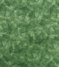 a green background that looks like it has been dyed with some paint on it and is very