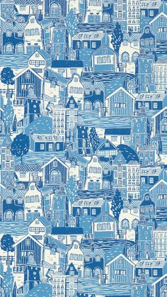 a blue and white wallpaper with houses on it