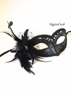 Black Womens masquerade mask with polka dot tulle, black feather mask with diamond crystals Black Masquerade Mask For Wedding Carnival, Elegant Black Masquerade Mask For Halloween, Elegant Black Masks For Carnival, Black Feathered Masquerade Mask For Costume Party, Elegant Feathered Masquerade Mask For Mardi Gras, Elegant Feathered Masquerade Mask, Feathered Eye Mask For Masquerade Costume, Elegant Feathered Eye Mask For Masquerade, Elegant Black Masquerade Mask For Mardi Gras