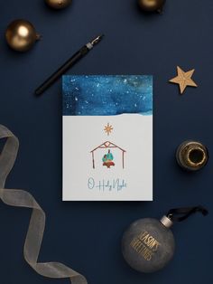 a christmas card with a nativity scene on it and other holiday decorations around it