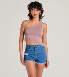 For an effortless flirty outfit, pair this one-shoulder crop top with a trendy pair of denim! It features a single shoulder strap, an adjustable side drawstring to let you customize the fit, and an asymmetrical cropped hem on soft knit fabric. Complete the look in a denim midi skirt and sneakers.Fit & FeaturesSoft knit stretchy fabric, bust liningOne-shoulder necklineSide adjustable drawstringAsymmetrical cropped hemRuns true to size Midi Skirt And Sneakers, Asymmetrical Crop Top, Flirty Outfits, Skirt And Sneakers, Denim Midi Skirt, Shoulder Crop Top, Black Crop Tops, Stretchy Fabric, Soft Knits