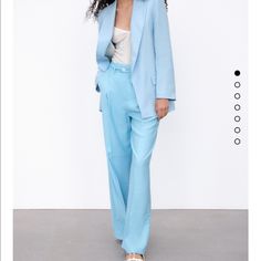 Viscous Polyester Spring Blue Wide Leg Pantsuit, Chic Blue Pantsuit With Trousers, Chic Blue Pantsuit With Pockets, Elegant Light Blue Pants For Summer, Elegant Light Blue Summer Pants, Blue Straight Leg Spring Pantsuit, Blue Straight Leg Pantsuit For Spring, Chic Tailored Blue Pants, Chic Light Blue Straight Leg Pants