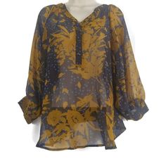 Gorgeous Earthy Navy And Gold Colors On This "Silky" And Lightweight Sheer Chiffon Blouse Featuring A Beautiful Floral Design, Henley Placard Neckline, Button Cuff Sleeves, Shirtail Hem Brand: Olivia Moon Mrsp: $58.00 Size: S Measurements: Armpit To Armpit 21" Length Shoulder To Hem 28" Condition: New With Tag Fabric: Poly Wash Instructions: Hand Color: Navy/Gold Smoke Free Environment Blue Silk Blouse With Blouson Sleeves, Blue Chiffon Blouse With Floral Print, Sheer Chiffon Blouse For Work, Flowy Chiffon Blouse For Work, Sheer Chiffon Flowy Blouse, Sheer Flowy Chiffon Blouse, Sheer Chiffon Blouse, Moon Top, Floral Chiffon Blouse