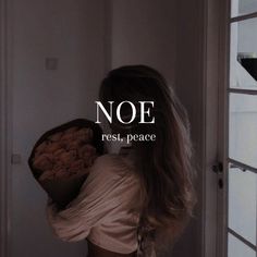 a woman with long hair is holding flowers in her hand and the words noe rest, peace above her head