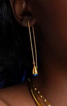 Introducing our newest chain threader earrings featuring a classic teardrop silhouette and a touch color. Option to wear alone in one piercing or thread through multiple piercings. Handcrafted by artisans in Kenya using traditional heritage techniques, 24K gold-plated brass and recycled glass. Dimensions: 5.03 in(128mm) Gold Threader Earrings, Chain Threader Earrings, Threader Earrings Gold, Multiple Piercings, Threader Earrings, Precious Gems, Glass Earrings, Recycled Glass, Cute Earrings