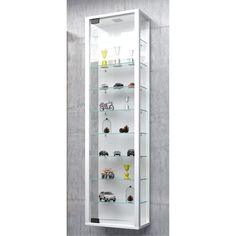 a white display case filled with lots of glass shelves