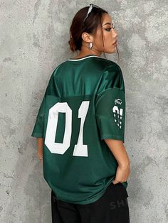 SHEIN USA Sporty V-neck Top For College, Green Short Sleeve Sportswear Jersey, Green Crew Neck Jersey For Sports Season, Green Crew Neck Jersey For Football Season, Green V-neck Tops For Streetwear, Green V-neck Streetwear Tops, Green Tops For College Football Season, Green Casual Jersey For Sports Events, Casual Green Jersey For Sports Events