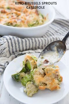 a white plate topped with broccoli and cheese casserole