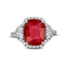 Step into a world of opulence with the Cushion Ruby Half-Moon Diamond Halo Ring, a resplendent masterpiece that exudes regal elegance. At the heart of this exquisite piece lies a majestic cushion cut ruby, a gemstone revered for its deep, passionate red hue. Flanking the ruby on each side are half-moon diamonds and a halo of round brilliant cut diamonds, adding the perfect touch of sparkle. Luxury Ruby Gemstone Ring In Platinum, Cushion Cut Diamond Gemstones For Fine Jewelry, Cushion Cut Diamond Fine Jewelry, Luxury Gia Certified Cushion Cut Ruby Ring, Gia Certified Cushion Cut Ruby Ring For Formal Occasions, Formal Gia Certified Cushion Cut Ruby Ring, Luxury Cushion Cut Ruby Ring With Diamond, Red Diamond Ring With Brilliant Cushion Cut, Red Cushion Cut Brilliant Diamond Ring