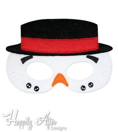 a white mask with a black top hat and orange nose