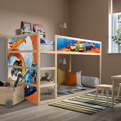 a child's bedroom with bunk beds and toys