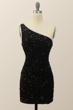 Be daring and dazzling in this sexy one-shoulder black sequin bodycon mini dress. It features a black sequin material that will hug your curves and a one-shoulder design that shows off your silhouette. The mini length will give you a flirty look and with a zip-up back, you'll look and feel confident. Winter Sweet 16 Dresses Short, Middle School Dance Dresses Black, Black Snowball Dresses, Masquerade Dresses Short, Homecoming Dresses One Shoulder, Hoco Dresses One Shoulder, Black Sparkly Dress Hoco, Sparkly Black Hoco Dress, Black And Gold Homecoming Dress