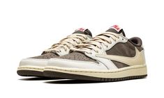 The Travis Scott x Air Jordan 1 Low “Reverse Mocha” is a collaboration between the hip-hop artist and Jordan Brand on the low-top lifestyle shoe that “reverses” the color block of the duo’s original Jordan 1 Low collaboration from 2019.  Released in July 2022, the “Reverse Mocha” features the same color block as Travis and Jordan Brand’s “Mocha” or “Cactus Jack” Jordan 1 Low, albeit in a flipped color coordination.  The perforated toe, mid-panel, and collar are designed in mocha (brown) nubuck. Mocha Shoes, Reverse Mocha, Wings Logo, Hip Hop Artists, Air Jordan 1 High, Air Jordan 1 Low, Jordan 1 High, Jordan 1 Low, Air Jordan 1 Retro