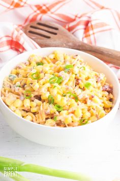 a white bowl filled with macaroni and cheese