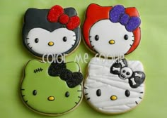 three decorated cookies with hello kitty on them