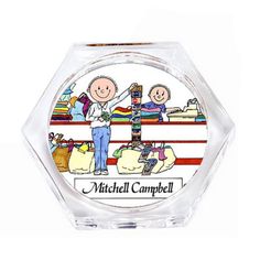 a glass ashtray with an image of two people in a boxing ring and the words mitchell campbell on it