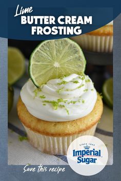 lime butter cream frosting on top of a cupcake with a lime slice in the middle