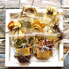 a box filled with lots of food on top of a wooden table