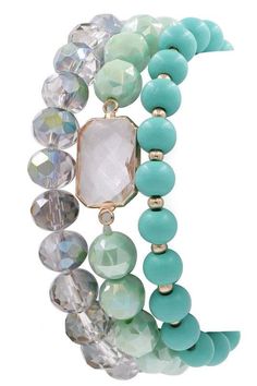 Stack of three beaded stretch bracelets in coordinating colors of mint. Wear them together or alone. Measurements: Stretch *All Jewelry is Final Sale* Boutique Warehouse, Gold Wrap, Printed Handbags, Chunky Beads, Crown Jewels, Coordinating Colors, Beaded Stretch Bracelet, Bracelet Stack, Faceted Bead