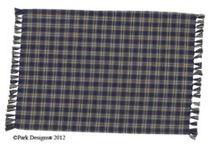 a blue and yellow plaid fabric with fringes