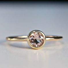 Classic Morganite Round Cut Rings, Classic Morganite Ring With Round Cut, Classic Morganite Solitaire Rings, Classic Morganite Diamond Ring In Yellow Gold, Classic Gold Morganite Jewelry, Classic Morganite Gold Jewelry, Eco-friendly Morganite Diamond Ring, Solitaire Morganite Round Ring, Rose Gold Morganite Topaz Ring