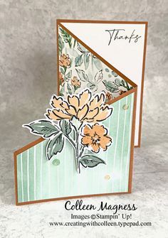 a close up of a card with flowers on it