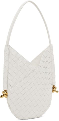 Intrecciato-woven grained leather shoulder bag in white. · Fixed shoulder strap · Knotted hardware at sides · Self-tie fastening at throat · Integrated suede zip pouch at interior · Suede lining · H11.5 x W9 · Total height: H17.5 Supplier color: White/Brass Luxury White Shoulder Bag With Intrecciato Weave, Luxury White Intrecciato Weave Shoulder Bag, White Woven Leather Evening Shoulder Bag, Designer White Shoulder Bag With Braided Handles, Luxury White Woven Leather Shoulder Bag, Designer White Shoulder Bag With Woven Leather, Modern White Shoulder Bag With Intrecciato Weave, White Intrecciato Weave Crossbody Bag, Modern White Bag With Intrecciato Weave