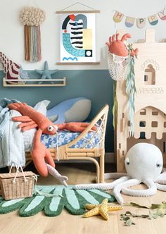 a child's bedroom with toys and decor on the floor