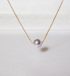 "Simple but very elegant necklace that is perfect for bridal gifts and everyday wear. // ITEM DETAILS // *This listing item for Lavender Pearl Necklace, but you can select the defferent colors of the pearl (see photo4) - Genuine Lavender Swarovski Crystal Pearl measures 8mm - 14K Gold Fill, 14k Rose Gold Fill, Sterling Silver chain and findings Also, available in Gold Plated, Rose gold Plated, Silver Plated chain and findings - Beautiful gift wrapped with note in the box // LENGTH // - Length sh Elegant Purple Clavicle Chain Necklace, Elegant Purple Necklace With Delicate Chain, Elegant Purple Round Pendant Necklace, Lavender Elegant Necklace For Wedding, Elegant Lavender Necklace For Wedding, Elegant Lavender Wedding Necklace, Elegant Purple Pearl Drop Necklace, Elegant Purple Pearl Necklace For Wedding, Elegant Single Strand Lavender Necklace