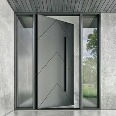 gloryirondoors handcraft black iron pivot door with full iron panel Custom Pivot Front Door, Grey Entrance Door, Grey Door Design Modern, Main Door Design Entrance Black, Black Pivot Door, Grey Doors Exterior Entrance, Black Entrance Door Modern, Black Main Door Entrance, Black Modern Front Door Entrance