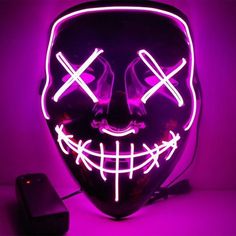 INCREDIBLY UNIQUE AND EXCLUSIVE LIGHT UP HALLOWEEN MASK 2020's Best Selling Mask!! The original Light Up Masks "Stitched" Mask available in 2 unique light colors! Stand out at any occasion with the most impressive LED Mask on the market The LED lights do not affect eyesight as the lights are on the opposite side of the mask and do not consist of harmful rays Our Adjustable Nylon Strap allows you to easily adjust this mask for small, medium, and large-sized heads. 3 Modes Settings Completely amaz Neon Mask, Halloween Led Lights, Dark Mask, Halloween Lamps, Mascaras Halloween, Light Mask, Plastic Mask, Halloween Costume Mask, Ghost Lights