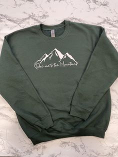 Gildan brand sweatshirt 50% cotton 50% polyester  Unisex sizing  Runs true to size  This soft crewneck is a great gift for anyone who loves to hike or go on adventures in the mountains! Fall Crew Neck Sweatshirt For Outdoor, Fall Outdoor Crew Neck Sweatshirt, Fall Crew Neck Sweatshirt For Adventure, Fall Crew Neck Sweatshirt For Hiking, Fall Hiking Crew Neck Sweatshirt, Fall Hiking Sweatshirt Crew Neck, Casual Crew Neck Sweatshirt For Adventure, Outdoor Fleece Sweatshirt With Graphic Print, Fall Hiking Sweatshirt With Letter Print