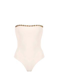 The Nancy in Latte by Seashell is a high cut One-Piece swimsuit. Dive into luxury with this strapless one-piece swimsuit adorned with opulent gold seashell hardware. Designed for the fashion-forward beachgoer, this swimsuit effortlessly combines elegance and allure.
 Size: S, M, L, XL, XXL Strapless One Piece, Eyewear Kids, Summer 2025, Black Swimwear, White Jewelry, One Piece Swim, Swimwear Outfit, High Cut, Eyewear Sunglasses