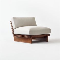 a chair that is made out of wood and fabric