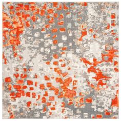 an orange and gray area rug with squares on the bottom, in various sizes and colors